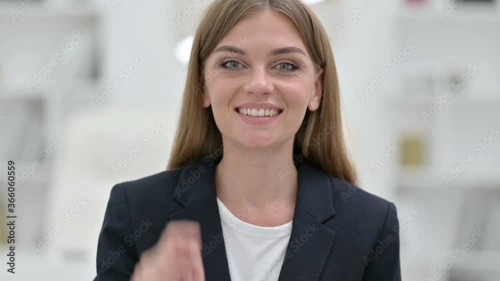 Portrait of Happy Young Businesswoman with Pointing with Finger Portrait of Happy Young Businesswoman with Pointing with Finger