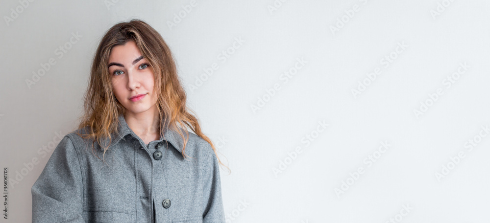 Happy smiling young beautiful woman giving hand for handshake, isolated over white background Happy smiling young beautiful woman giving hand for handshake, isolated over white background