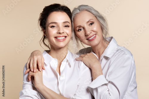 Smiling grandmother and daughter