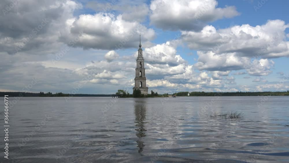 View of the flooded bell tower on the Uglich reservoir, cloudy July day. Kalyazin, Russia View of the flooded bell tower on the Uglich reservoir, cloudy July day. Kalyazin, Russia