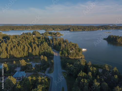 Tableau sur toile Photo from a drone over the sea, sunny evening, Scandinavian nature, yacht, Gulf of Finland, Finland