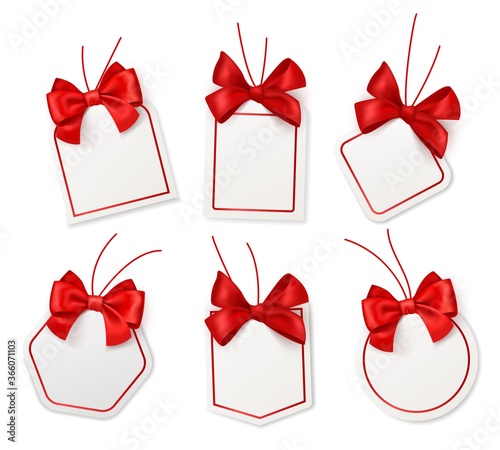 Tags with red bows. Blank white price labels with silk scarlet ribbons for christmas or birthday packaging gift vector realistic templates collection