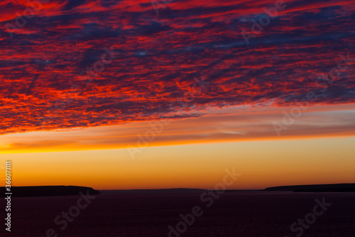 Drammatic sunset over the ocean photo