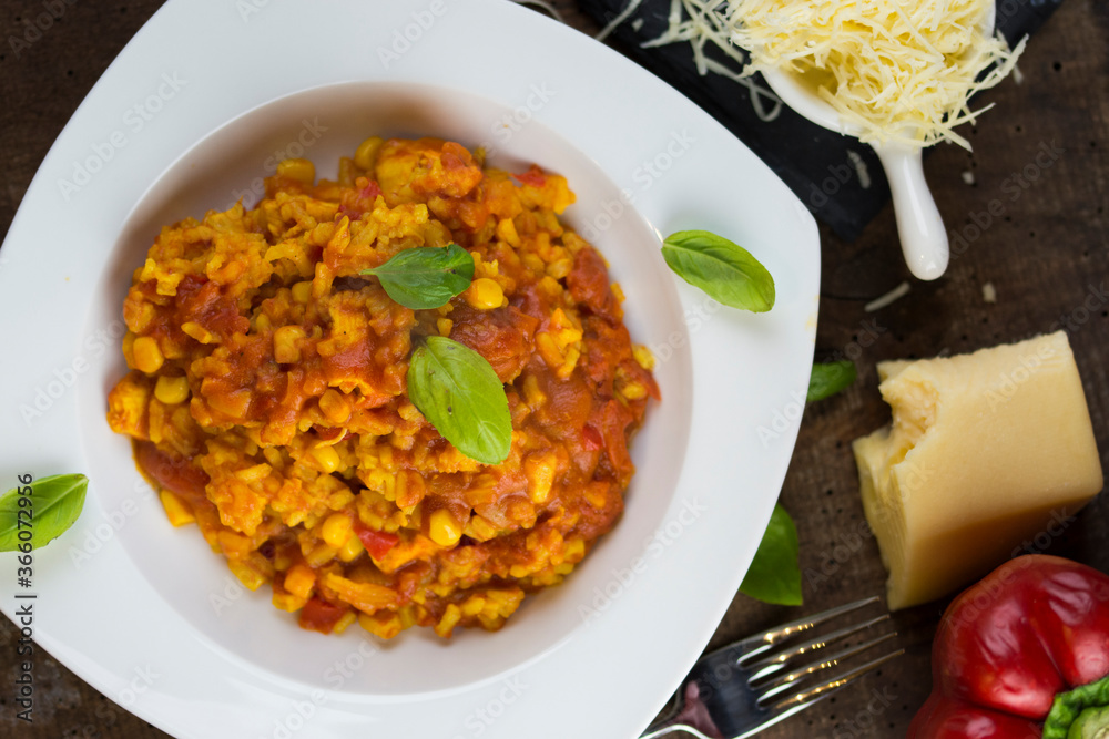 Rice and chicken breast cooked in tomato sauce. Rice and chicken breast cooked in tomato sauce.