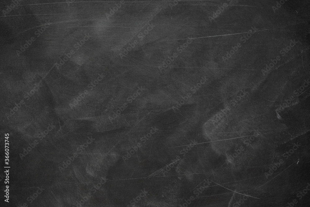 Obraz premium Texture of chalk rubbed out on blackboard or chalkboard background. School education, dark wall backdrop or learning concept.