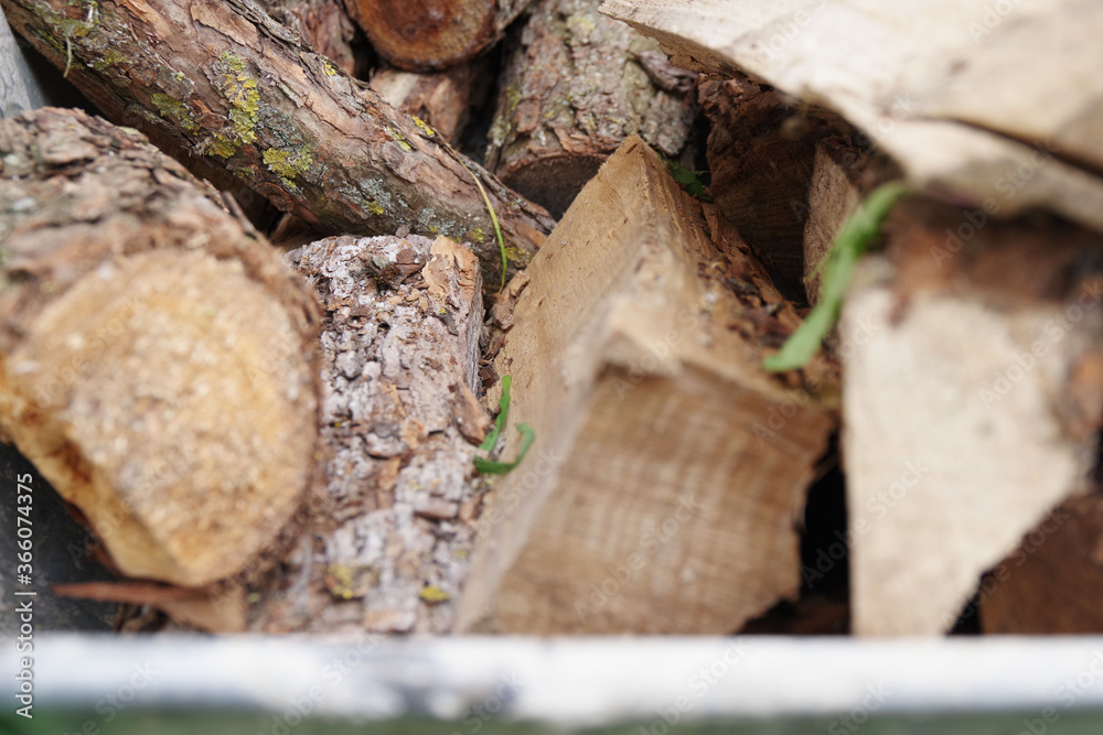 Stacks of firewood at the home. Firewood background. Pile of firewood. Stacks of firewood at the home. Firewood background. Pile of firewood.