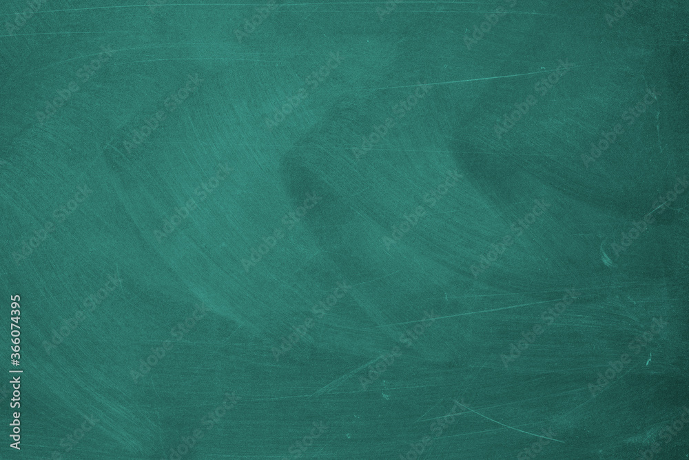 Obraz premium Texture of chalk rubbed out on blackboard or chalkboard background. School education, dark wall backdrop or learning concept.