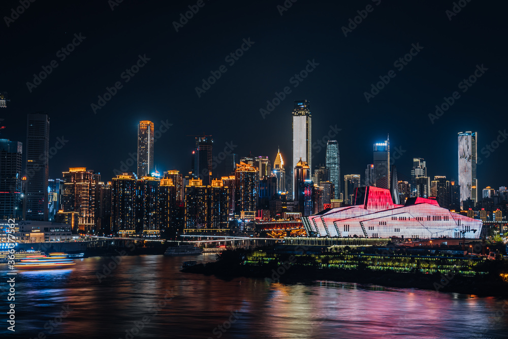 High-view night view of Chongqing Grand Theater and tall buildings in China