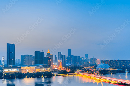 Night view of Shengjing Theater and urban buildings along the Hun River in Shenyang, Liaoning, China