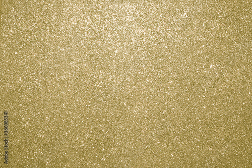 Luxury gold glitter with bokeh background, de-focused. concept for chrismas, holiday, happy new year, decoration.