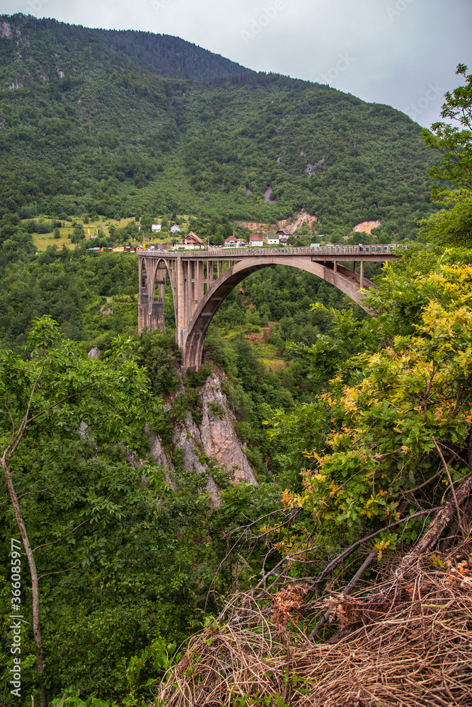 Mountain landscape, Montenegro. Durdevica Tara arc bridge in the mountains, One of the highest automobile bridges in Europe. Mountain landscape, Montenegro. Durdevica Tara arc bridge in the mountains, One of the highest automobile bridges in Europe.