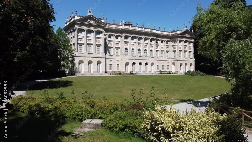 Europe Italy , Milan - Galleria d'Arte Moderna drone aerial view in Giardini Di Villa Reale Comunale. River and green lawn in front of it. Blue sky at summer day after Covid19 Coronavirus lockdown Europe Italy , Milan - Galleria d'Arte Moderna drone aerial view in Giardini Di Villa Reale Comunale. River and green lawn in front of it. Blue sky at summer day after Covid19 Coronavirus lockdown