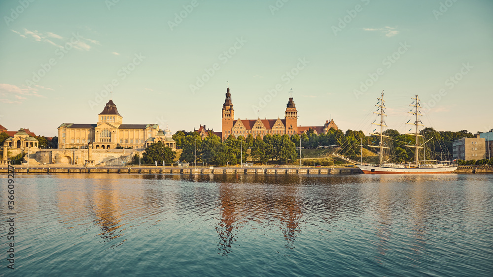 Retro toned panoramic picture of Waly Chrobrego (Hakenterrasse) with Provincial Office building and National Museum in Szczecin at sunrise, Poland.