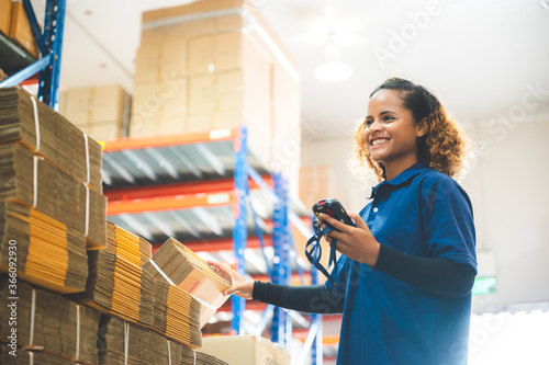 warehouse worker using bar ...