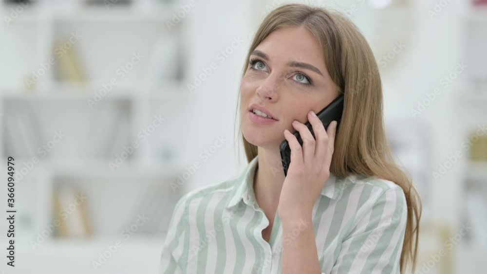 Portrait of Cheerful Young Woman Talking on Smartphone Portrait of Cheerful Young Woman Talking on Smartphone