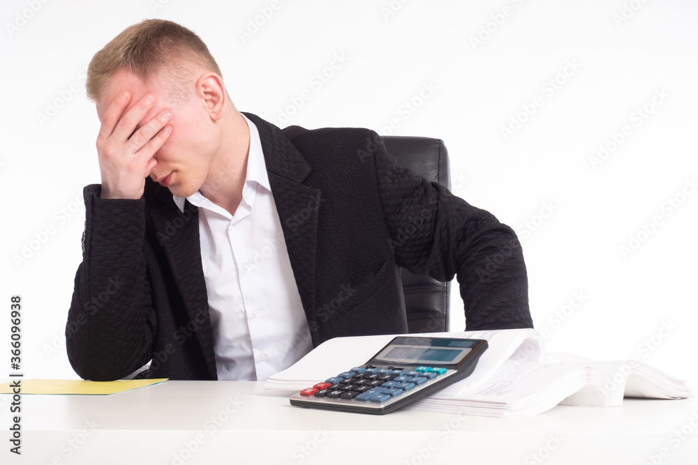 Displeased businessman is sitting table. Man in business suit ...