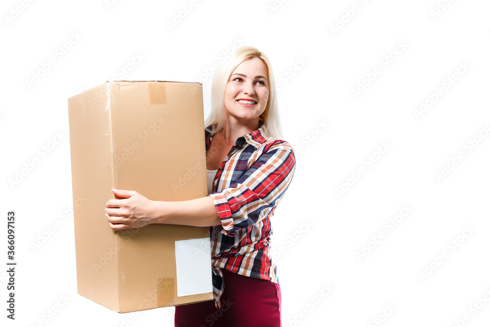 A young beautiful caucasian woman holding a box in her hands. A young beautiful caucasian woman holding a box in her hands.