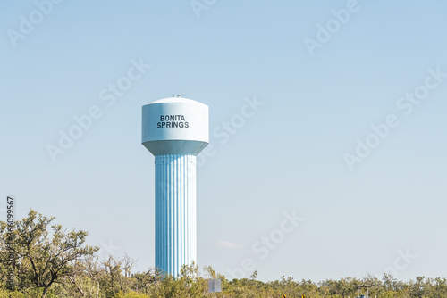 Bonita Springs water tank sign isolated against sky in Florida west coast, trees, nobody, landscape photo