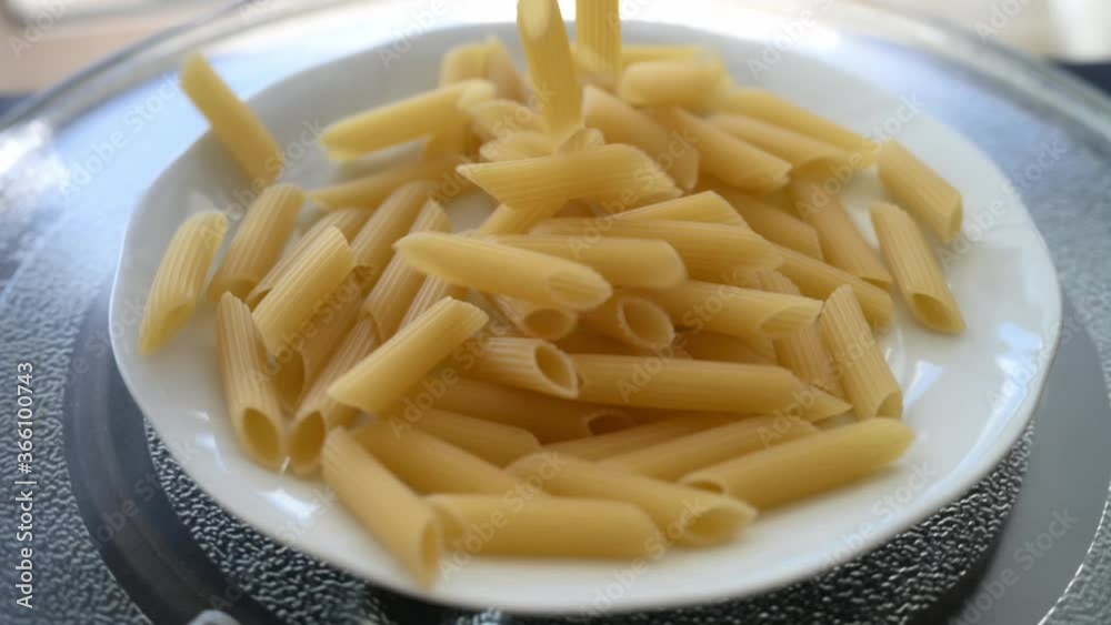 Macaroni Pasta Falling Down in to the pot Slow motion Macaroni Pasta Falling Down in to the pot Slow motion