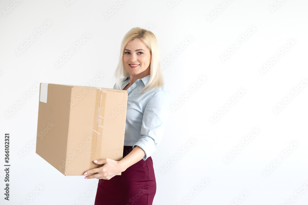 picture of attractive businesswoman delivering cardboard box picture of attractive businesswoman delivering cardboard box