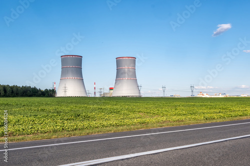 Cooling towers of nuclear power plant against the blue sky