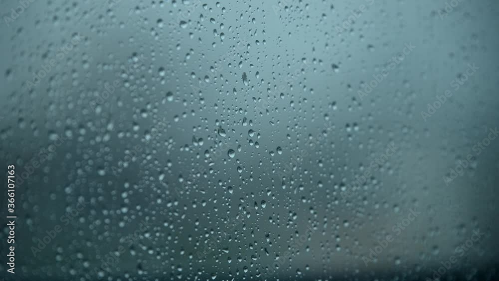 Rain drops flowing over a window on a rainy day.
The falling rain drops calm your mind.
I just want to look out the window. Rain drops flowing over a window on a rainy day.
The falling rain drops calm your mind.
I just want to look out the window.