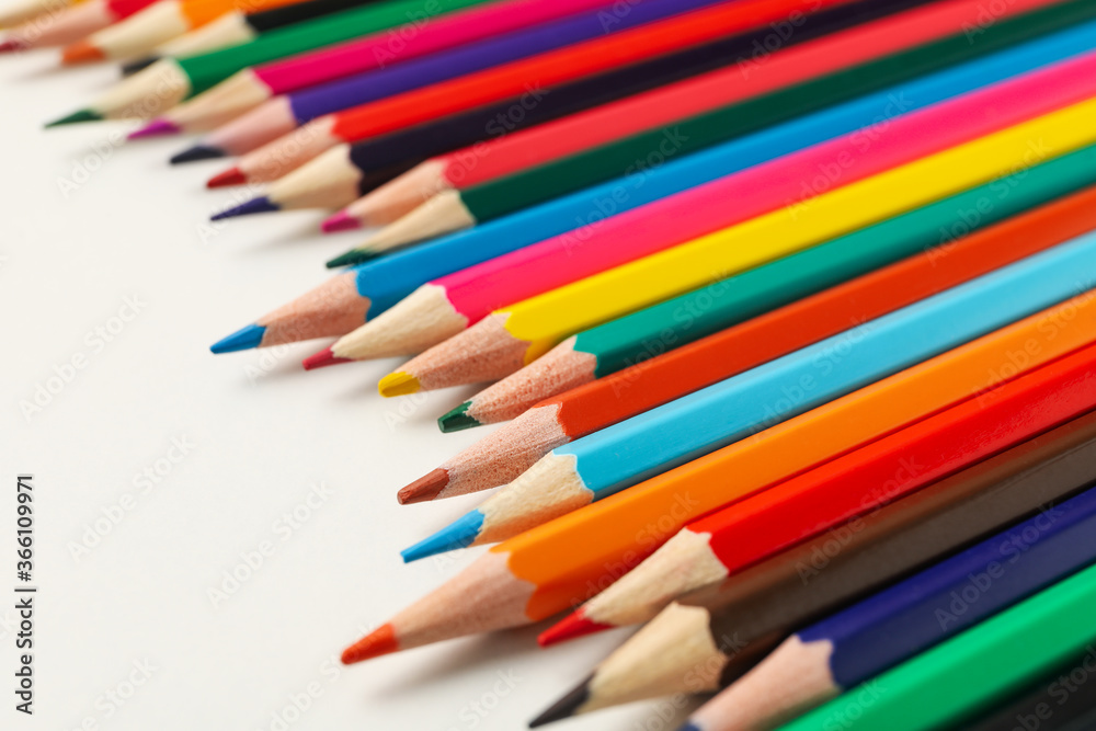 Colorful pencils on white background, close up Colorful pencils on white background, close up