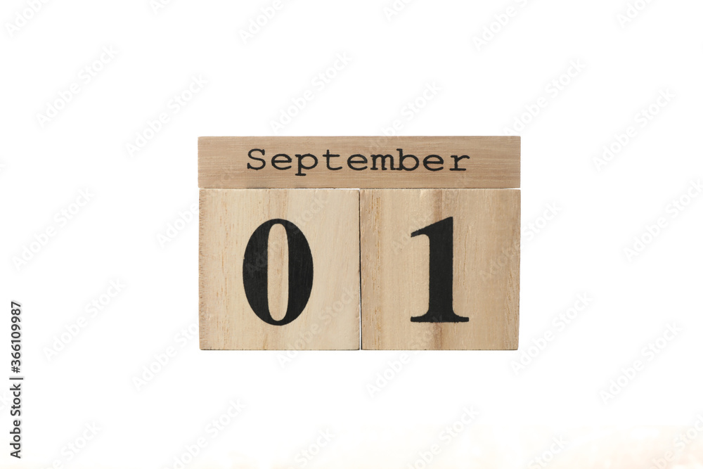 Wooden calendar with date September 1 isolated on white background Wooden calendar with date September 1 isolated on white background