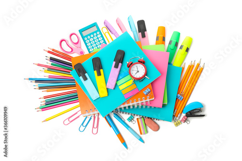 Pile of school supplies isolated on white background