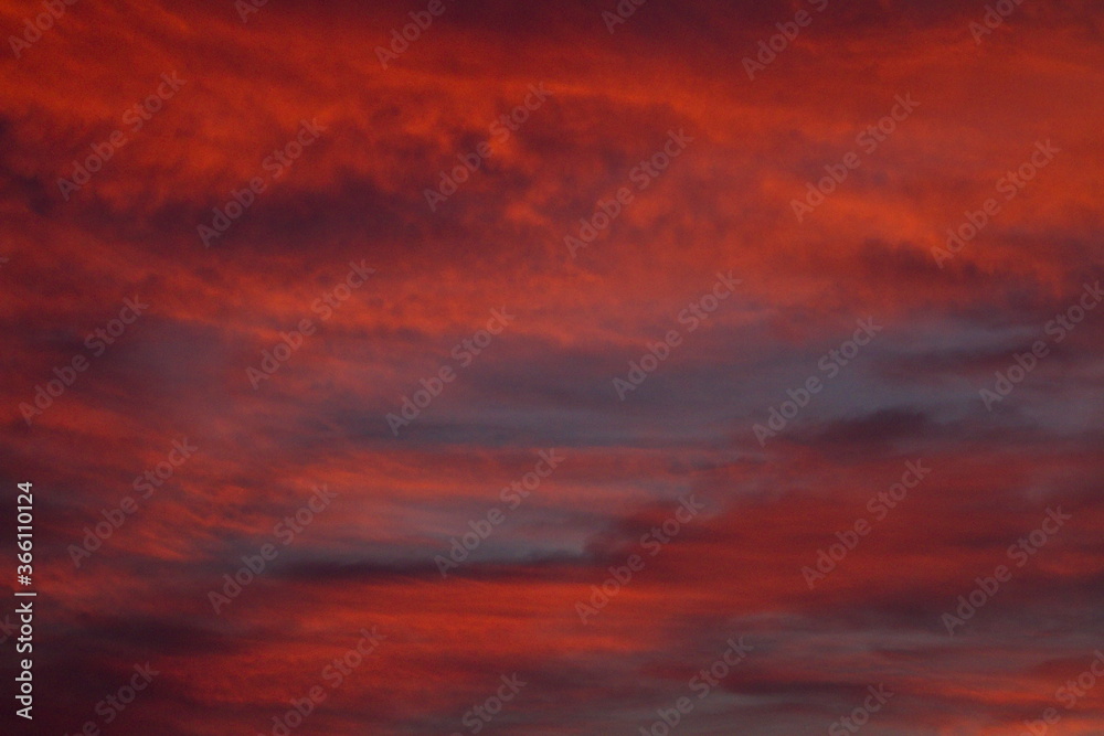 Colorful cloud patterns with golden hour light.