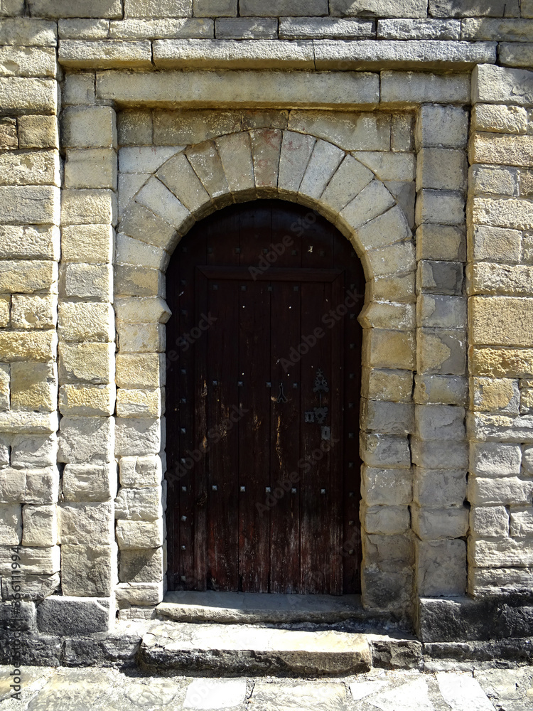 Main door of the Mozarab Pre-Romanesque or Romanesque Church of San Pedro de Larrede in the Serrablo Region. 10th-11th century. Aragon. Spain. Main door of the Mozarab Pre-Romanesque or Romanesque Church of San Pedro de Larrede in the Serrablo Region. 10th-11th century. Aragon. Spain.