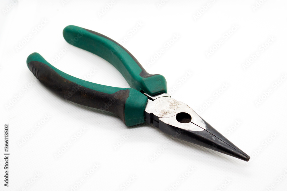needle nose pliers over a white background needle nose pliers over a white background