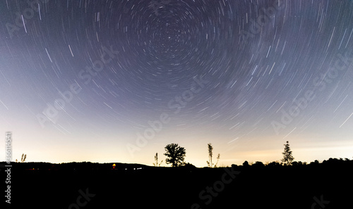 Star Trails and Comet NEOWISE Over a Field and Lone Oak Tree
