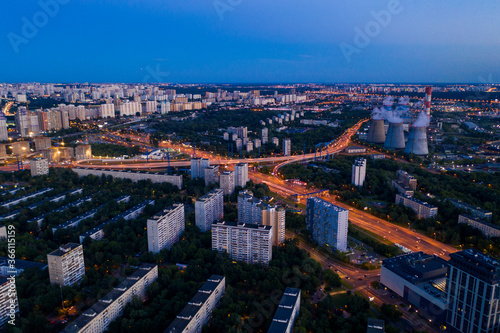 Fototapeta Naklejka Na Ścianę i Meble -  panoramic views of the city infrastructure in the evening filmed from a drone