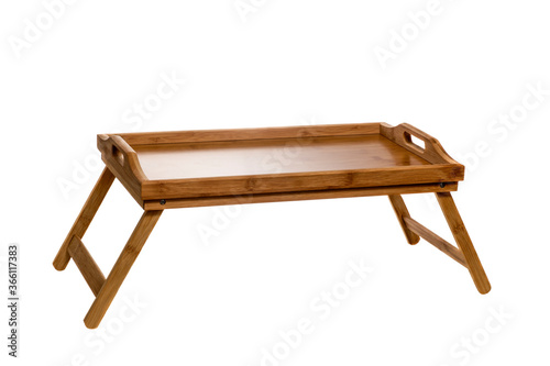 Bamboo tray with wooden legs isolated on white