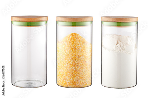 Corn grits and flour in a transparent glass container. The set of items is isolated on a white background.