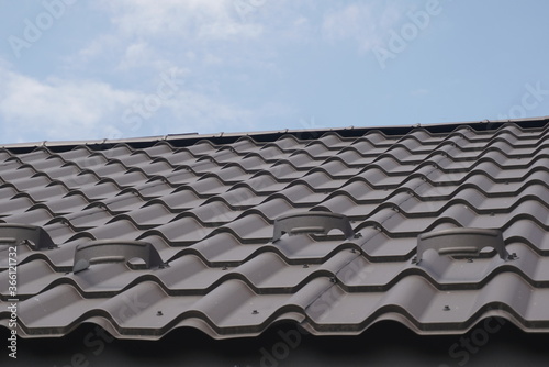 Black Metal Tile Roof. Roof Metal Sheets.