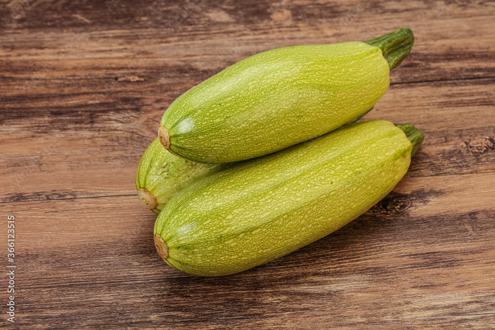 Young tasty zucchini over board Young tasty zucchini over board