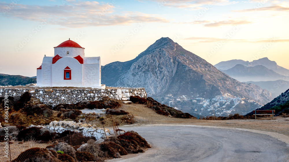GREECE, KARPATHOS - OCTOBER 17, 2019 - Church of St George, in the background the village of Olympos