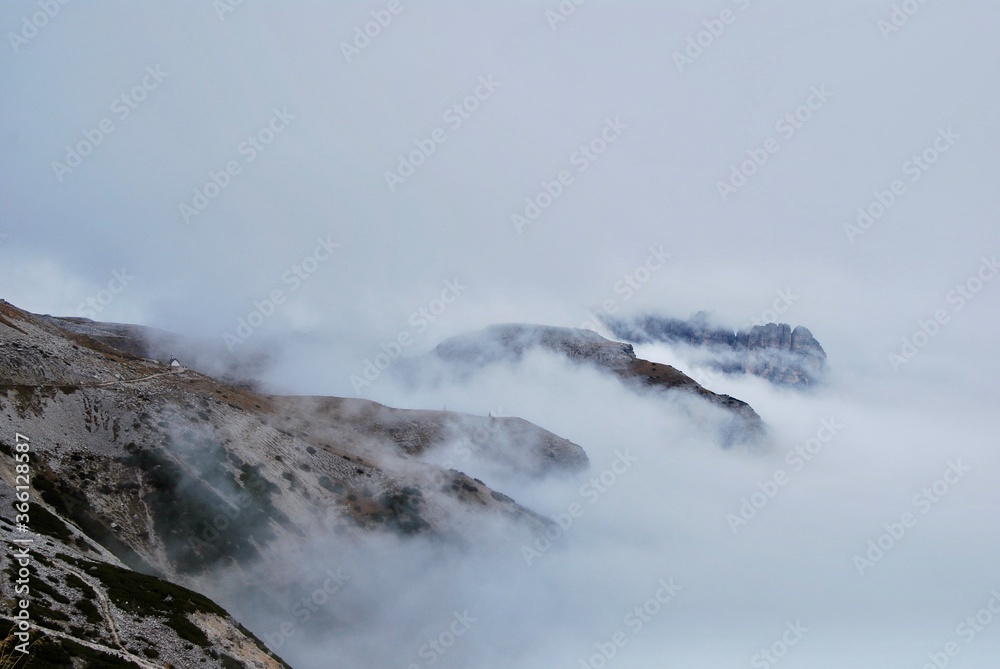 clouds covered mountains