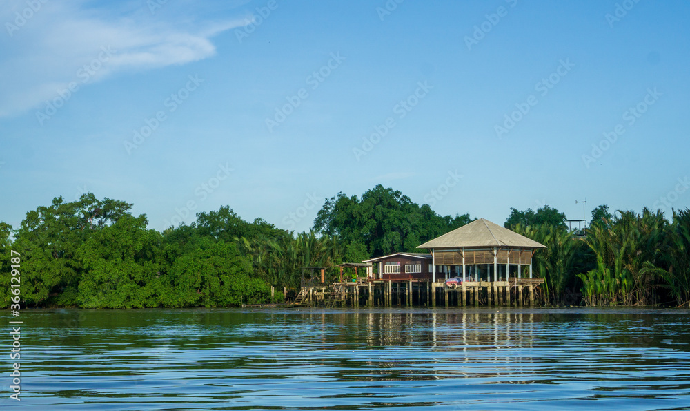 Obraz premium house on the river