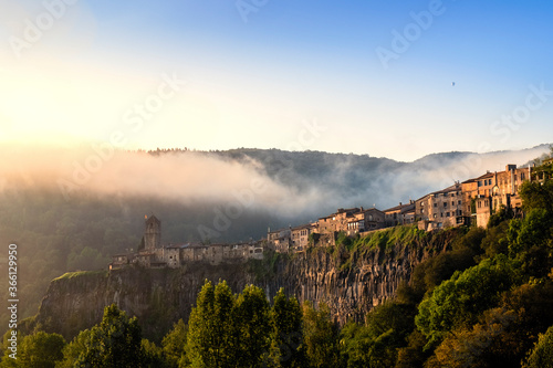 The clifftop village of Castellfollit de la Roca in the morning light, Garrotxa, Girona, Catalonia, Spain photo