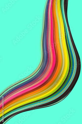 Abstract color wave curl rainbow strip paper on blue background