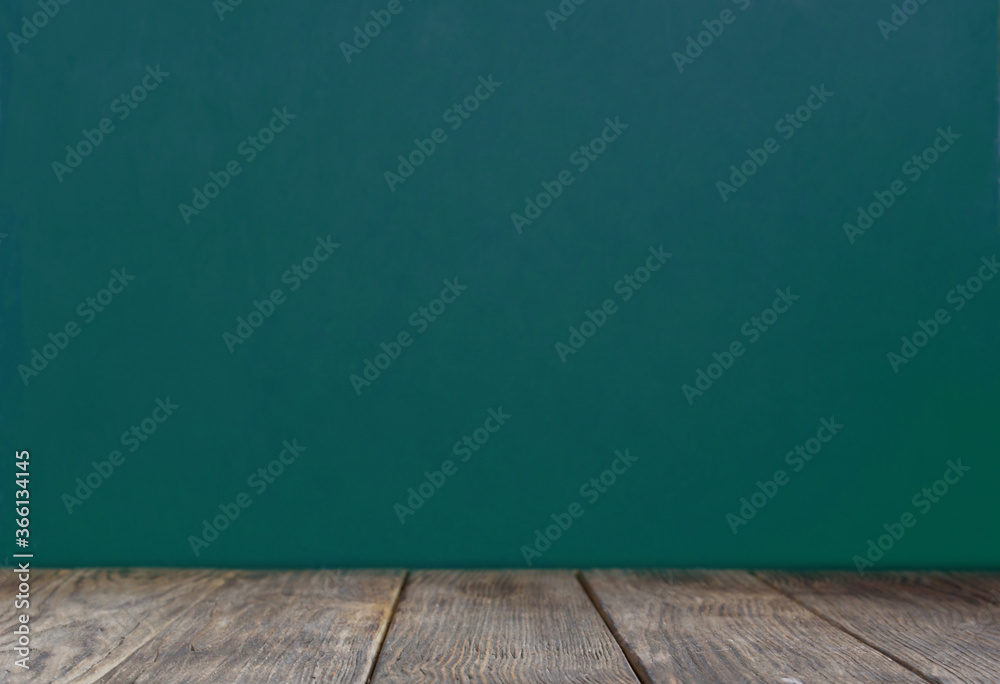 Blank green Chalkboard Background. Empty Wooden table. back to school concept. Blank green Chalkboard Background. Empty Wooden table. back to school concept.