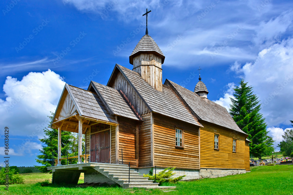 Old wooden catholic church in Oderne village near Gorlice, Low Beskids (Beskid Niski), Poland Old wooden catholic church in Oderne village near Gorlice, Low Beskids (Beskid Niski), Poland