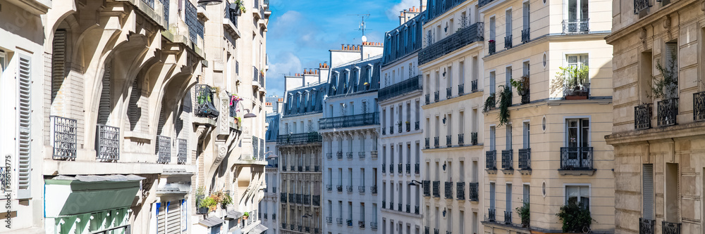 Paris, typical facades and street, beautiful buildings near Montmartre
