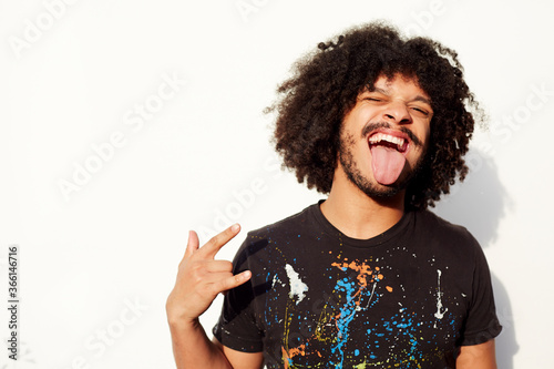 Portrait of young man standing indoors photo