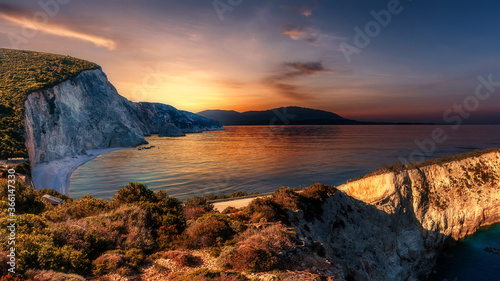 Impressively beautiful sunset over the coastline of Greece. Most Famous Porto Katsiki Beach during sunrise. Best famouse travel and holiday locations. Scenic Image Ionian Sea. Lefkada, Greece