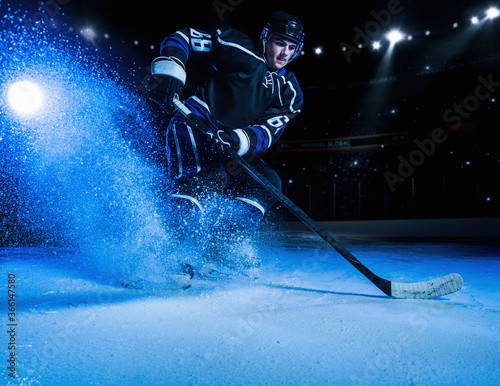 Hockey player on ice photo