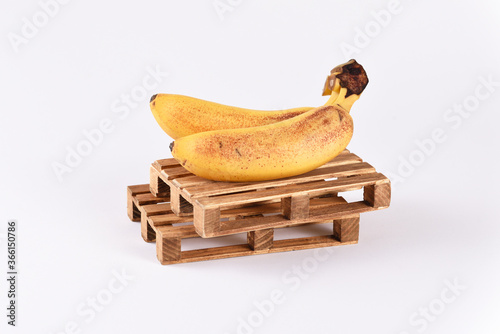 Bananas on the wooden pallets, transporting bananas.
